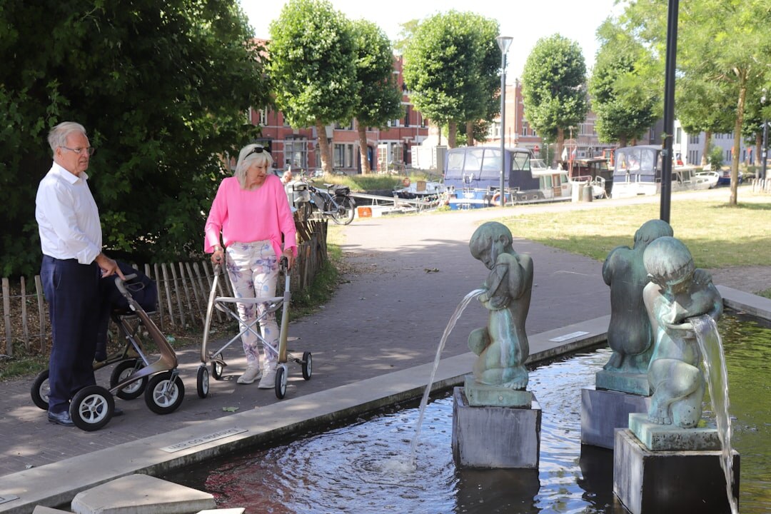 senior couple walking in park