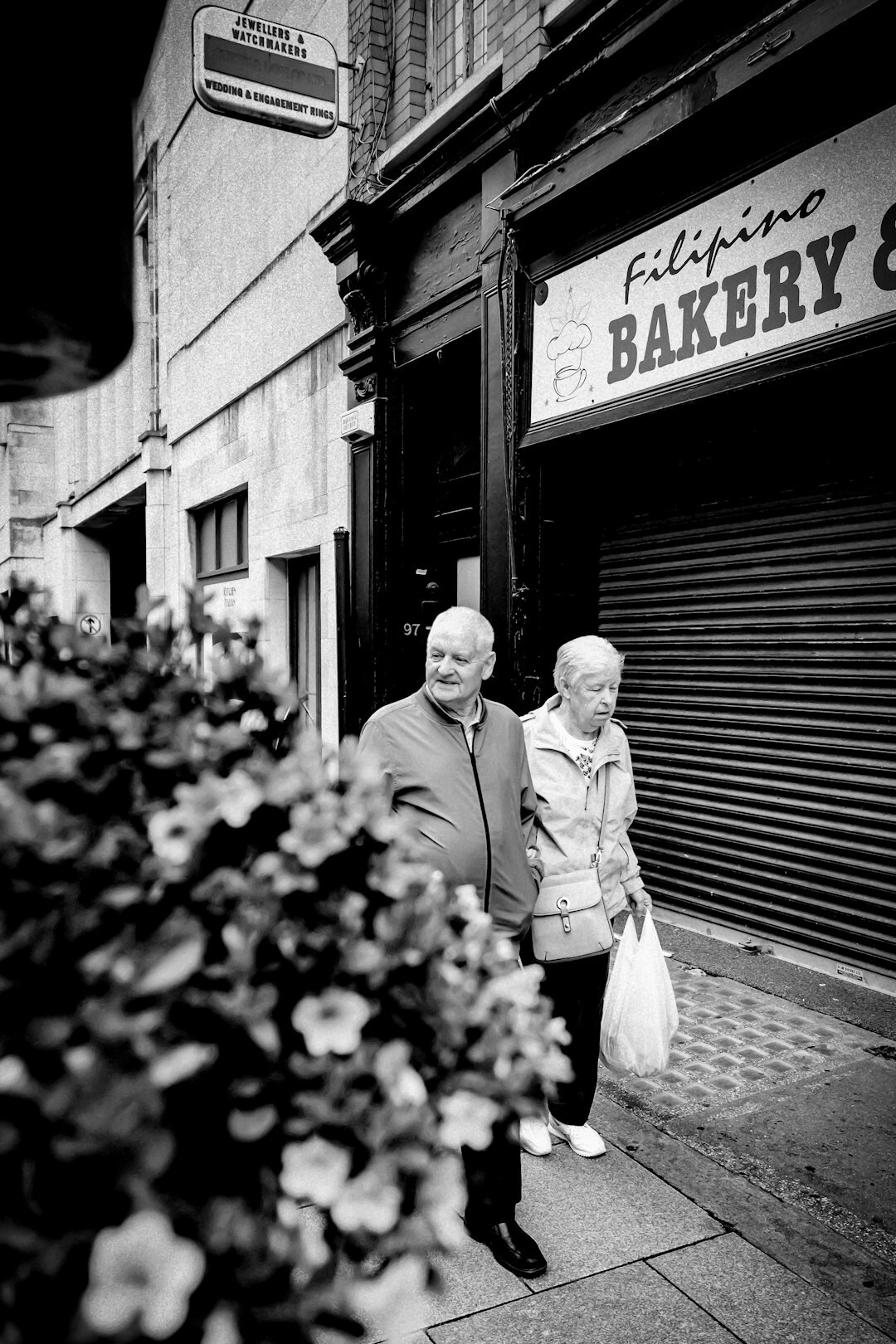 elderly couple walking