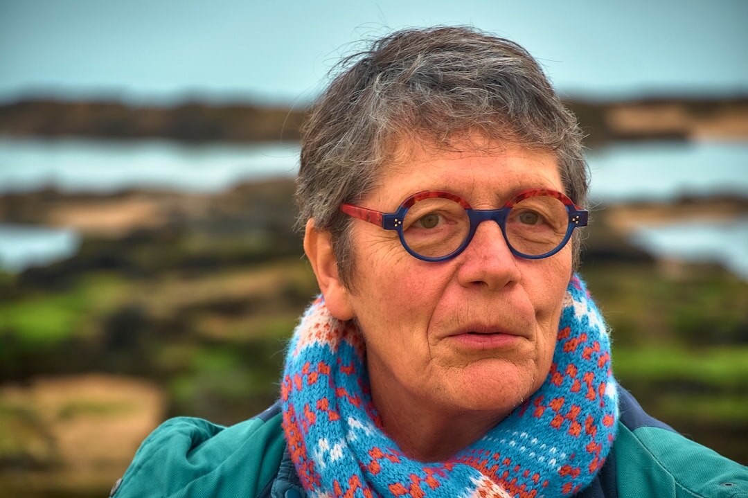 Portrait of a smiling Croatian senior woman with glasses